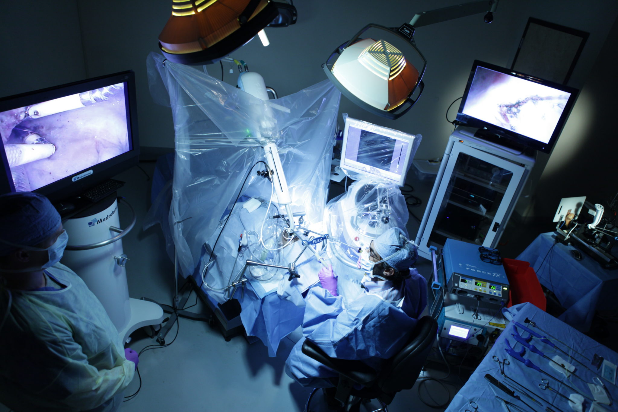 Surgeons using the Medrobotics Flex Robotic System during a procedure